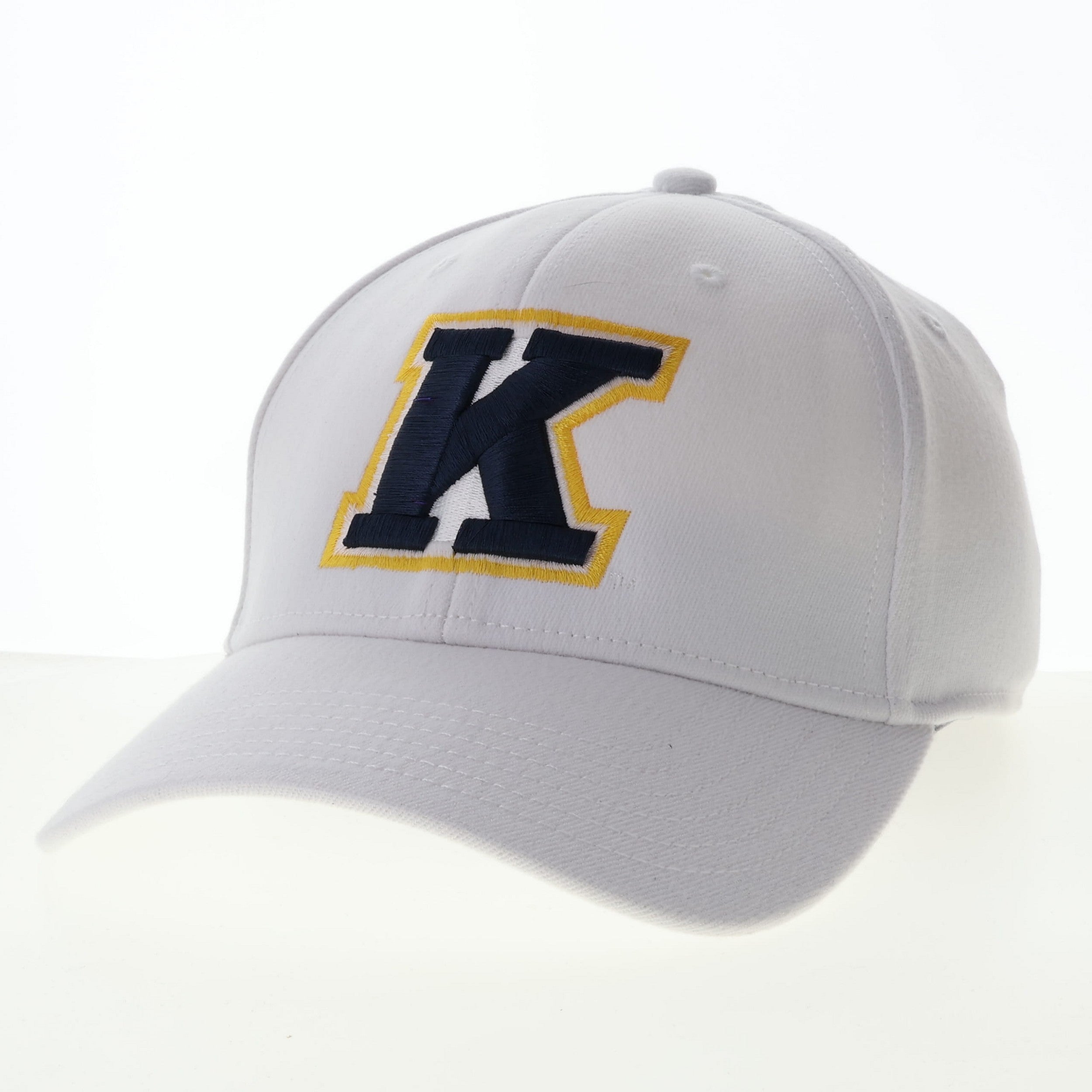Kent State White 717X With K Logo featuring a white cap with a large navy blue K outlined in gold, representing kent state apparel and kent state university style.