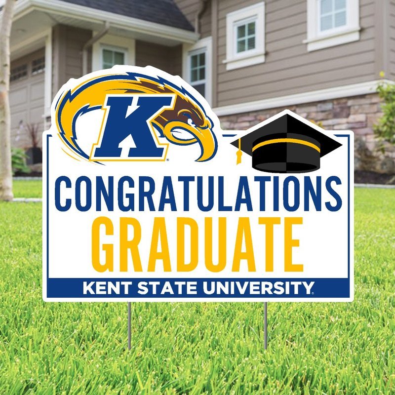 Kent State Congrats Grad Lawn Sign featuring the Kent State Golden Flashes logo, a graduation cap, and a message congratulating graduates on a lawn in front of a house.